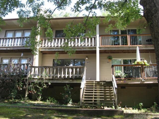 rear view of house with a balcony