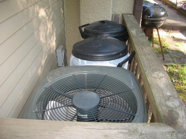 details with central AC unit and wooden walls