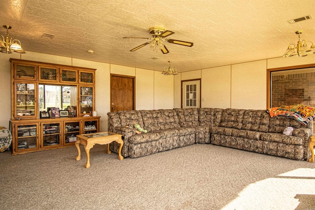 living room with ceiling fan and carpet flooring