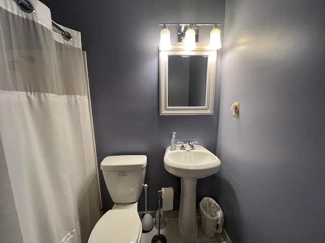 bathroom featuring toilet