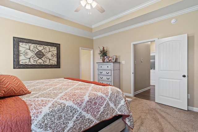 bedroom featuring ornamental molding, carpet floors, and ceiling fan