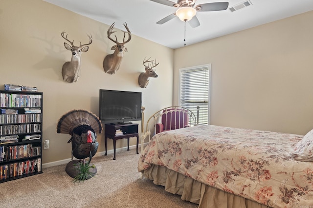 bedroom featuring ceiling fan and carpet flooring