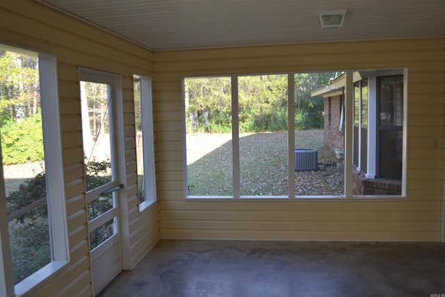 unfurnished sunroom featuring a healthy amount of sunlight