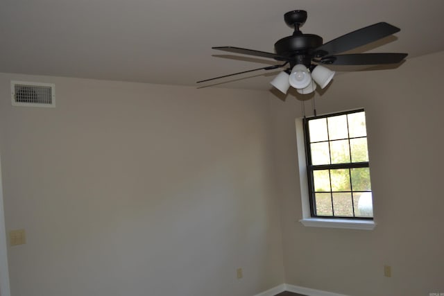 unfurnished room featuring ceiling fan