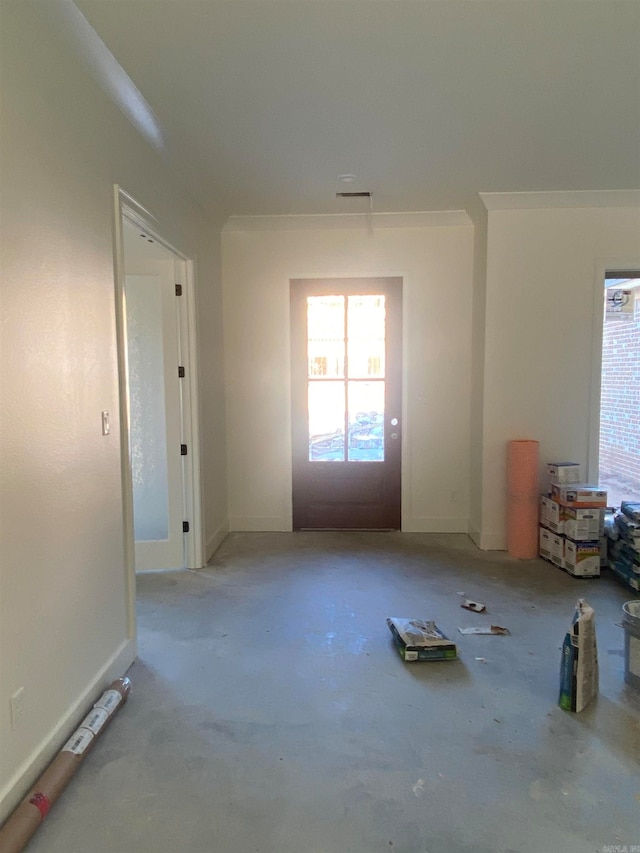 spare room featuring ornamental molding