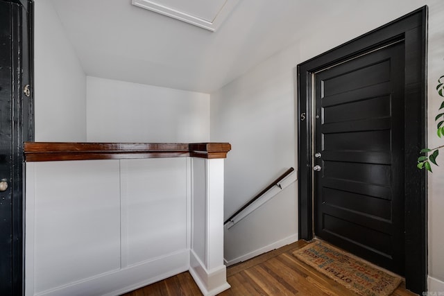 entryway with dark wood-type flooring