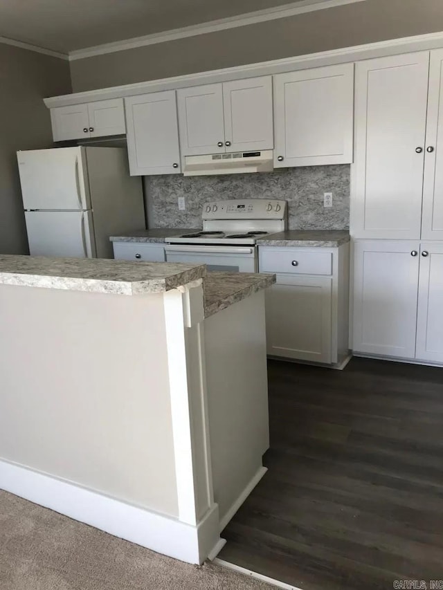 kitchen featuring dark hardwood / wood-style flooring, white cabinetry, white appliances, and decorative backsplash