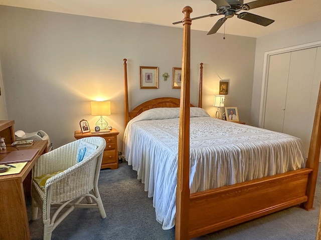 carpeted bedroom featuring a closet and ceiling fan