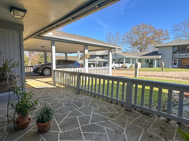 view of patio / terrace featuring a carport