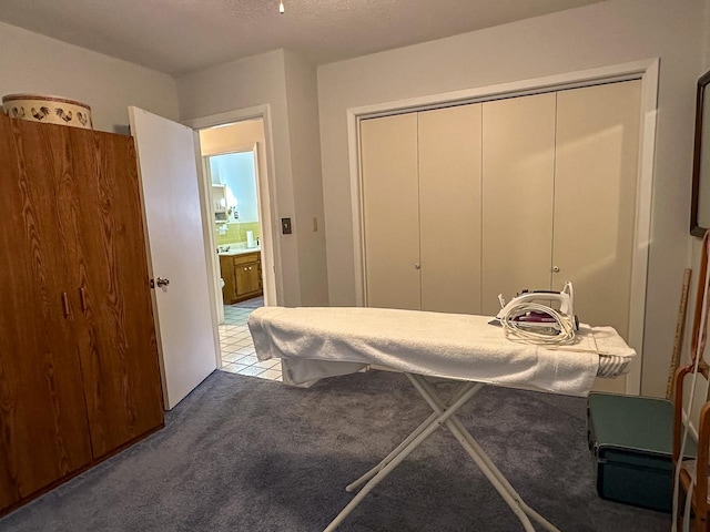 bedroom with a closet and carpet floors