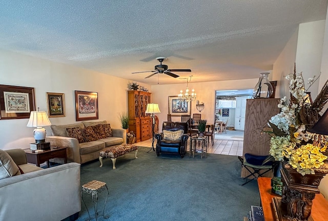 carpeted living room featuring ceiling fan with notable chandelier and a textured ceiling