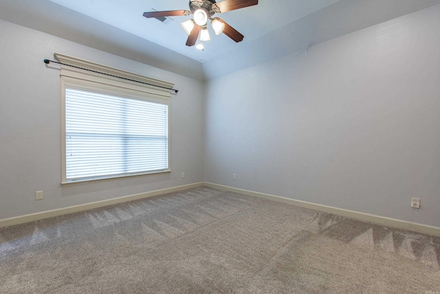 carpeted empty room with ceiling fan