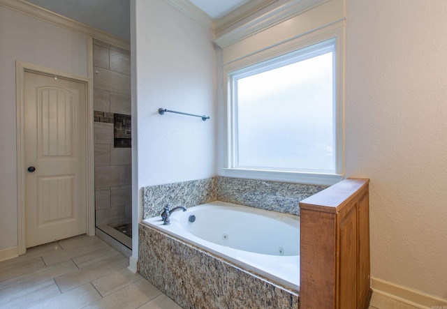 bathroom featuring shower with separate bathtub, tile patterned floors, and ornamental molding