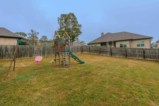 view of play area with a yard