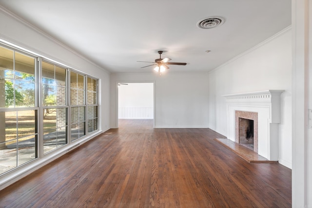 unfurnished living room with dark wood-type flooring, ceiling fan, and crown molding