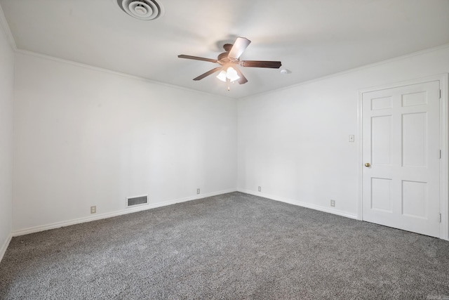 carpeted spare room featuring ceiling fan and ornamental molding