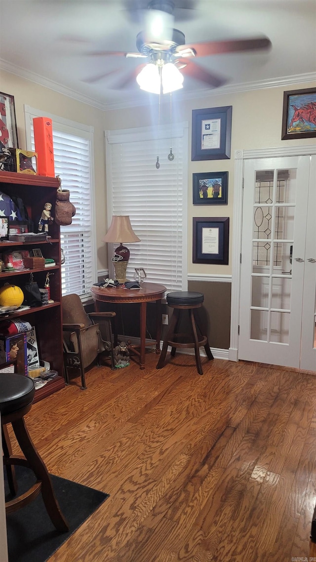 office area with hardwood / wood-style floors, ceiling fan, and crown molding