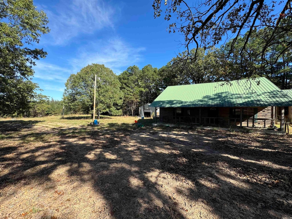 view of yard featuring a porch