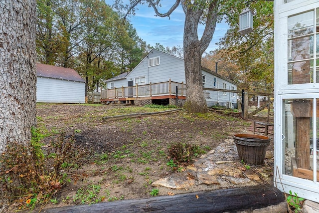 view of yard featuring a deck