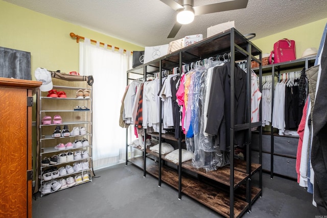 spacious closet with ceiling fan