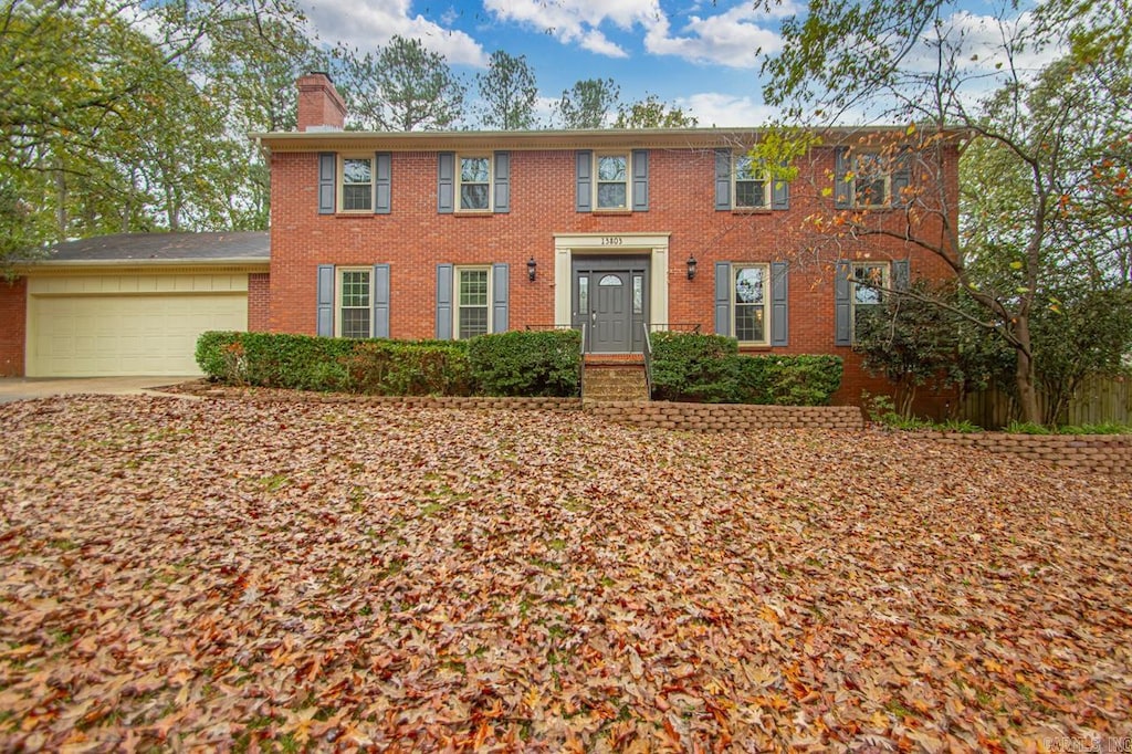 colonial-style house with a garage