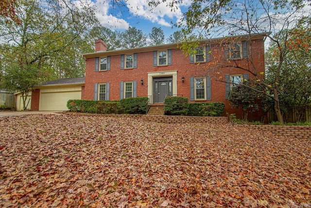 colonial house featuring a garage