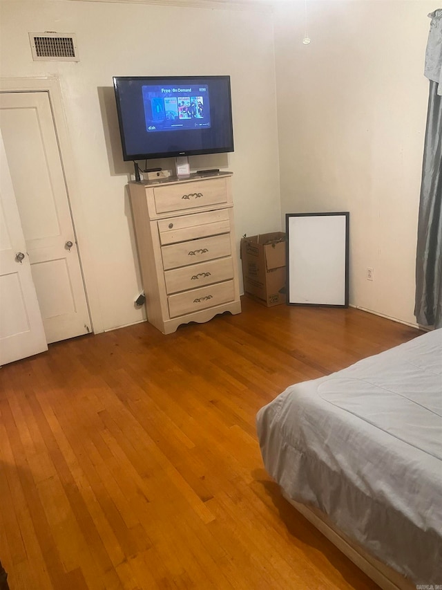 bedroom featuring light hardwood / wood-style floors