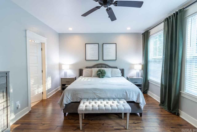 bedroom featuring dark hardwood / wood-style floors and ceiling fan