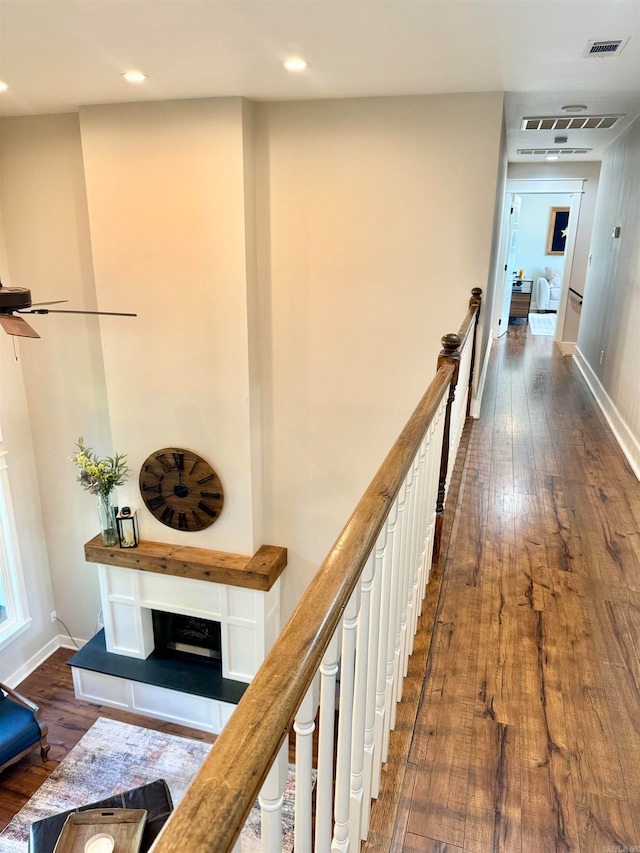 corridor with dark wood-type flooring