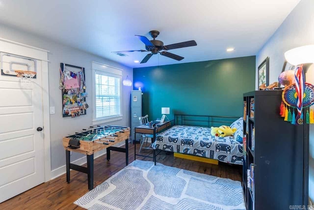 bedroom featuring ceiling fan and wood-type flooring