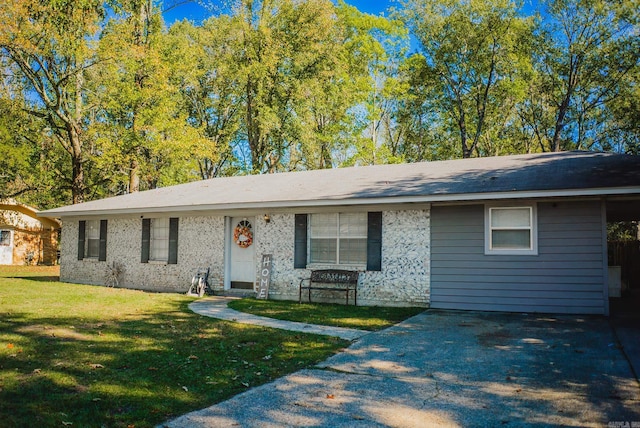 ranch-style house with a front lawn