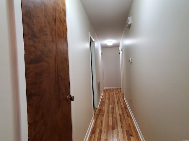 hallway featuring light hardwood / wood-style floors