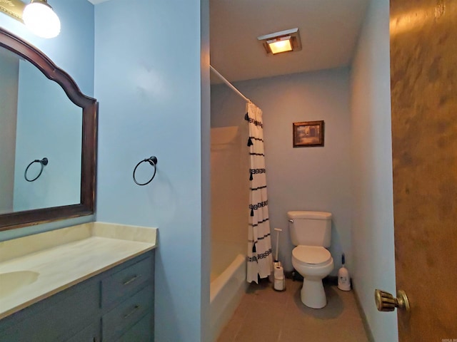 full bathroom with vanity, toilet, and shower / bath combo with shower curtain