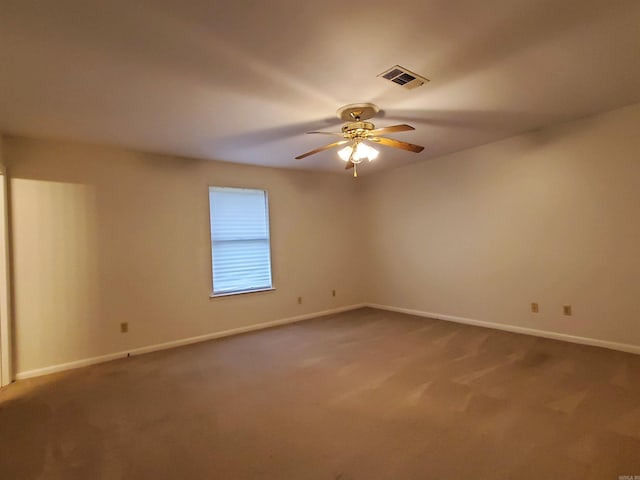 carpeted empty room with ceiling fan