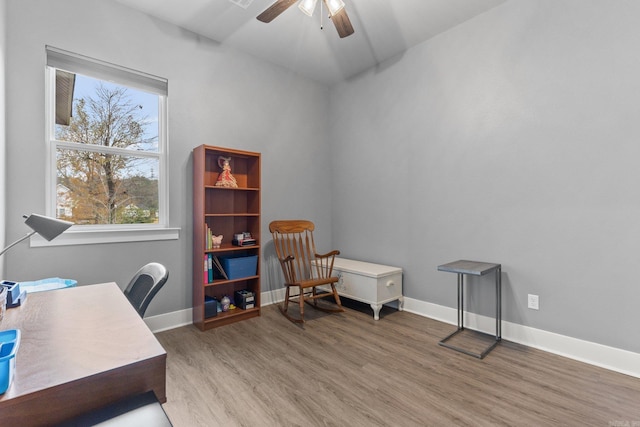 office space featuring hardwood / wood-style floors and ceiling fan