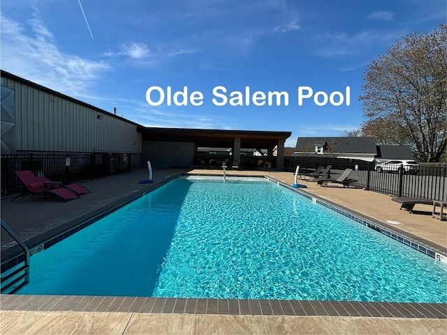 view of pool featuring a patio