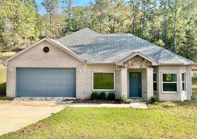 ranch-style home featuring a garage and a front lawn