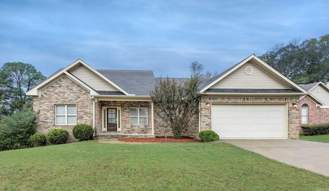 view of front facade with a garage and a front lawn