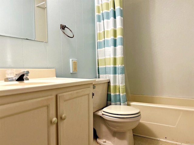 full bathroom with shower / bath combo, vanity, and toilet