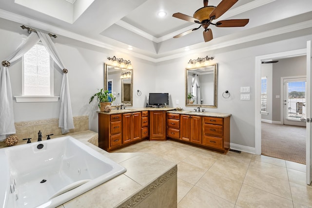 bathroom with ceiling fan, a relaxing tiled tub, tile patterned floors, vanity, and ornamental molding