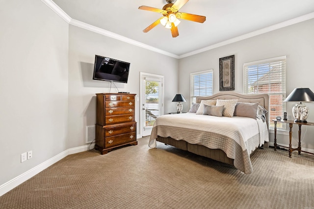 carpeted bedroom featuring multiple windows, access to exterior, ceiling fan, and ornamental molding