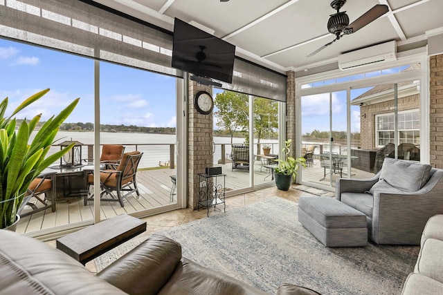 sunroom / solarium featuring ceiling fan and an AC wall unit