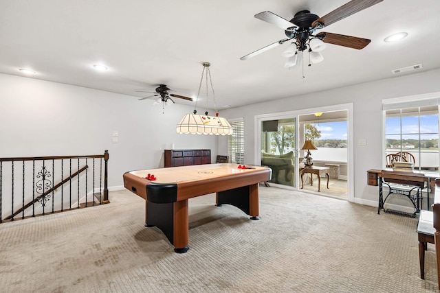 playroom featuring light colored carpet and ceiling fan