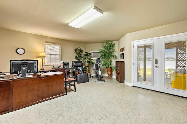 office area featuring a wall mounted AC and french doors