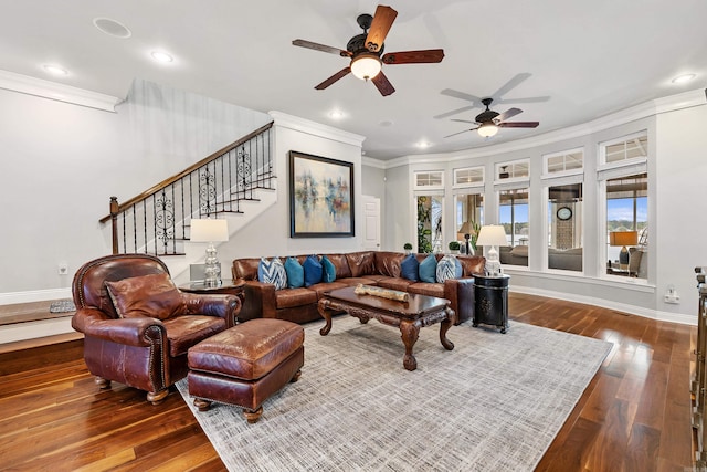 living room with wood-type flooring, ceiling fan, and crown molding