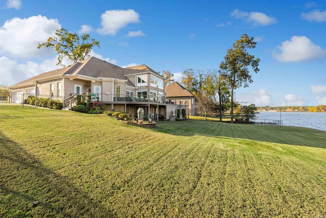 view of yard featuring a deck with water view