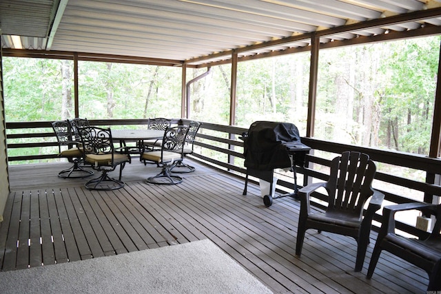 sunroom featuring a healthy amount of sunlight