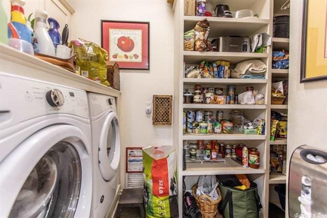 laundry area featuring washer and clothes dryer