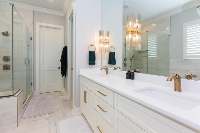 bathroom featuring vanity, an enclosed shower, and crown molding