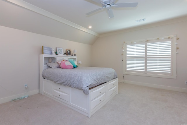 carpeted bedroom featuring ceiling fan and lofted ceiling